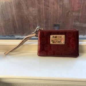 Michael Kors Burgundy Wristlet with Tan Strap